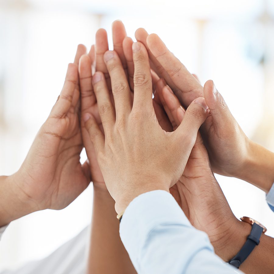 High five, hands and success in teamwork collaboration, global business or company diversity. Zoom, men and women in celebration, motivation or wow gesture in startup office team building with goals